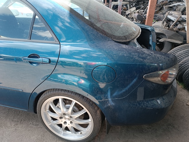 Крило заднє GJYA71410 MAZDA