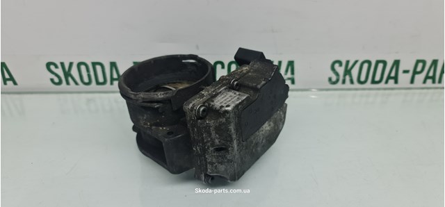 Дросільна заслінка в зборі 059128063B VAG