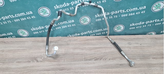 Трубка кондиціонера від компресора до радіатора 1K0820743BQ VAG