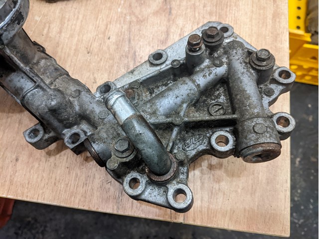 Корпус масляного фільтра 21311AA150 SUBARU