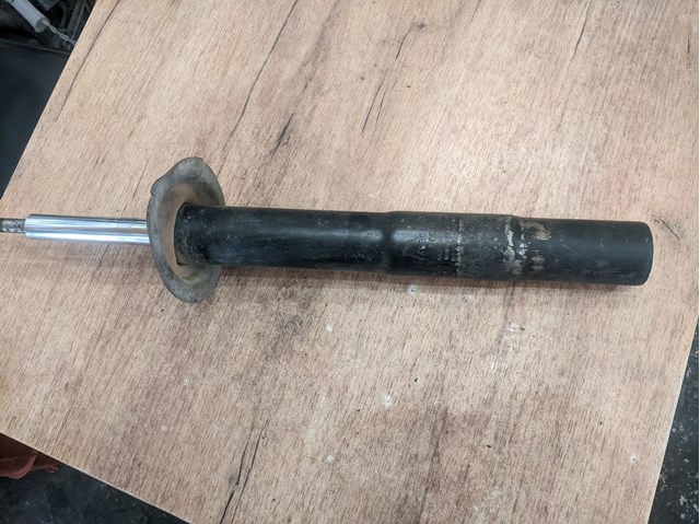 Амортизатор передньої підвіски 31311091921 BMW