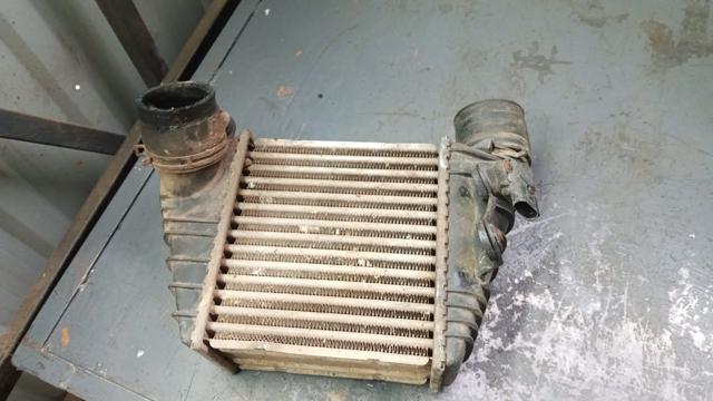 Охолоджувач наддувочного повітря 1J0145803 VAG