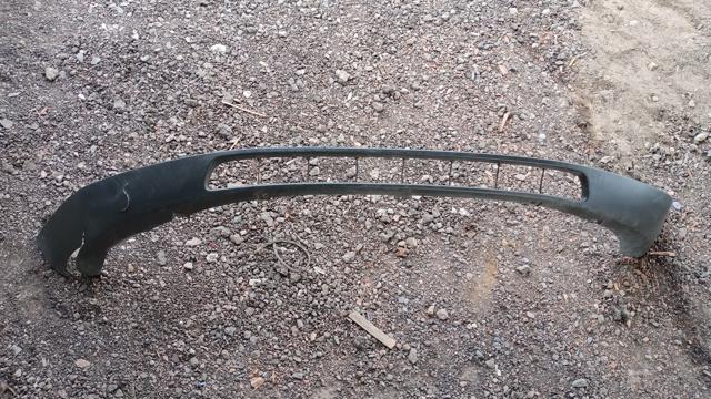 Губа переднього бампера 4M5117C749A FORD