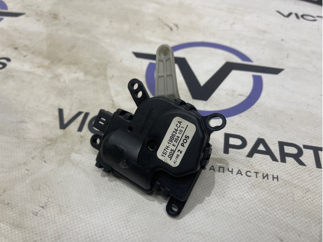 Мотор заслінки печі 1S7H19B634CA FORD