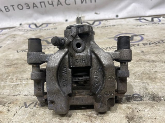 Супорт гальмівний задній правий 3Q0615424 VAG