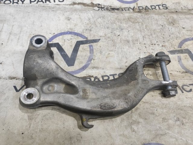 Вилка нижня амортизатора переднього, ліва 4M0413037F VAG