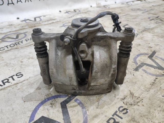 Супорт гальмівний задній правий 4M0615404A VAG