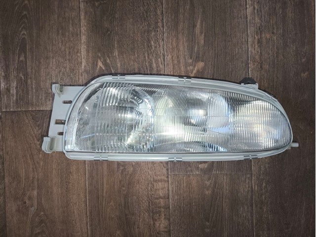 Блок фара ліва 3210094E POLCAR