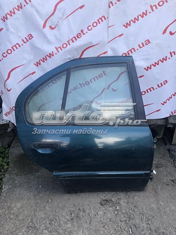 Двері задні в зборі 8210090J30 NISSAN