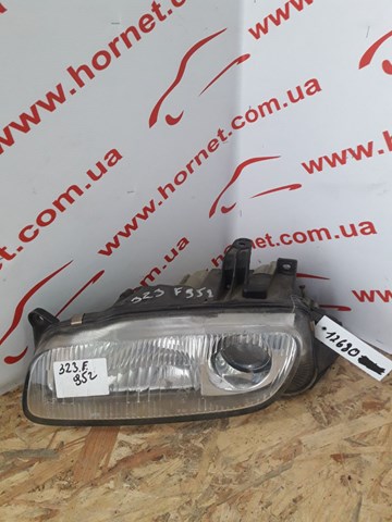 Фара основна ліва BC6A510L0D MAZDA