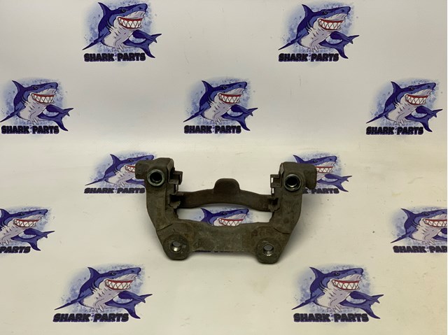 Скоба супорту заднього LR015521 LAND ROVER