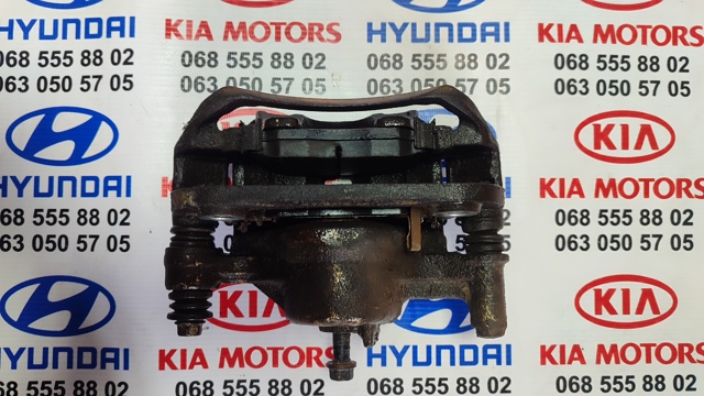 Супорт тормзной 581101J600 HYUNDAI