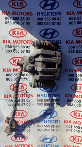 Задній гальмівний супорт лівий 582101D100 HYUNDAI