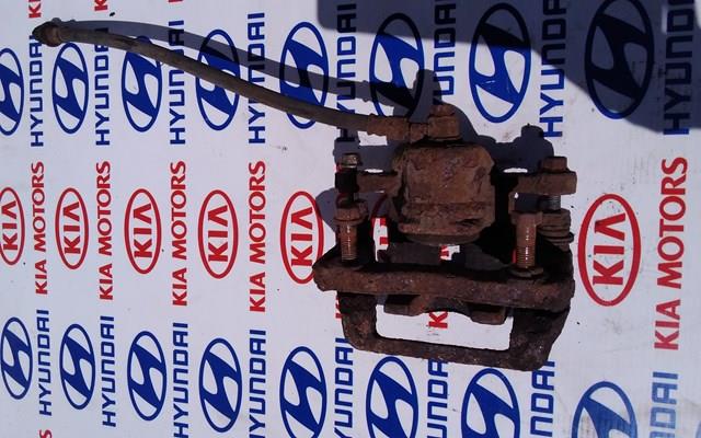 Задній гальмівний супорт лівий 582102E360 HYUNDAI