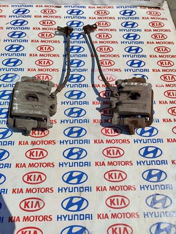 Задній гальмівний супорт лівий 582102W000 HYUNDAI