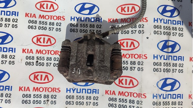 Супорт гальмівний задній правий 582301D100 HYUNDAI
