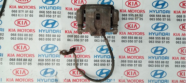 Супорт гальмівний задній правий 582302P700 HYUNDAI