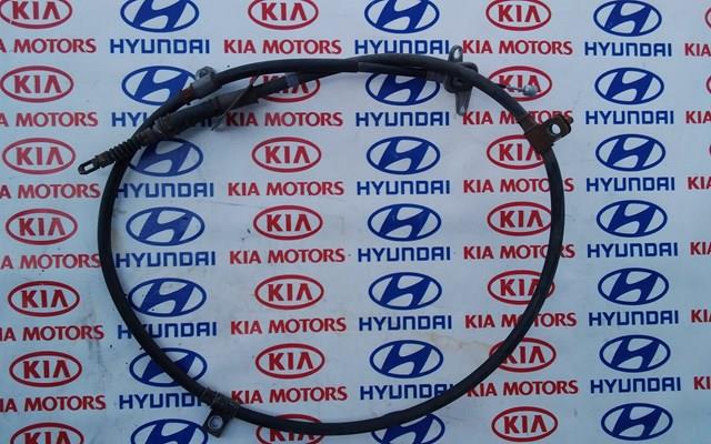 Трос ручного гальма задній, правий 597703Q300 HYUNDAI