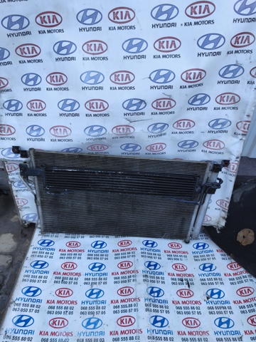 Радіатор кондиціонера 976062B100 HYUNDAI