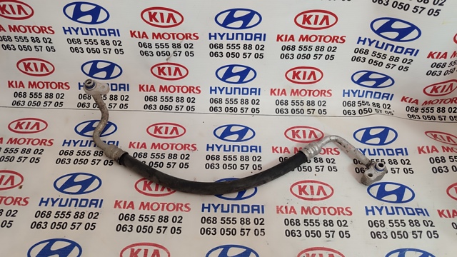 Трубка кондиціонера від компресора до радіатора 977623E000 HYUNDAI
