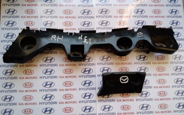Кронштейн бампера заднього, зовнішній правий KD53502H1 MAZDA