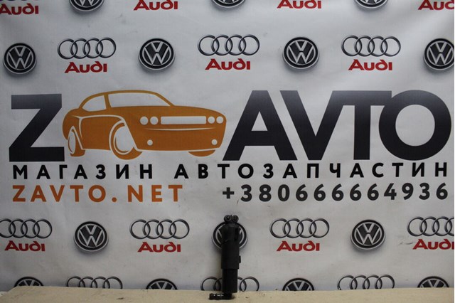 Форсунка омивача фари передньої, лівої 8T0955101 VAG