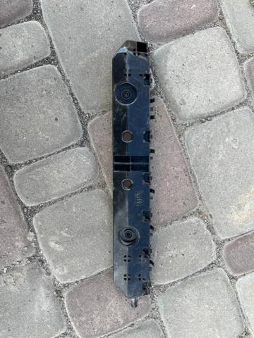 Кронштейн бампера заднього, правий 852265SK0A NISSAN