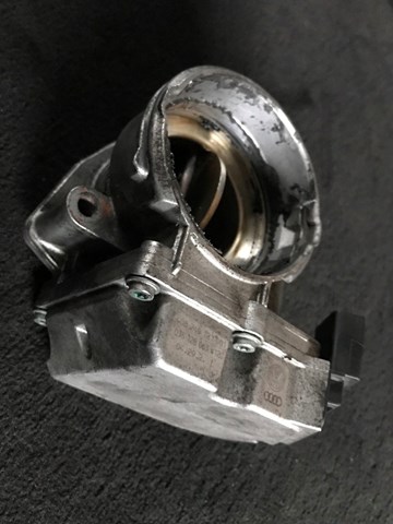 Дросільна заслінка в зборі 03G128063V VAG