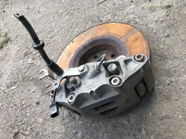 Супорт гальмівний, передній, правий 4F0615124 VAG