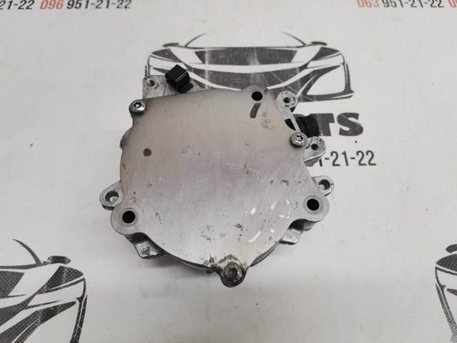 Насос вакуумний 06K145100BB VAG