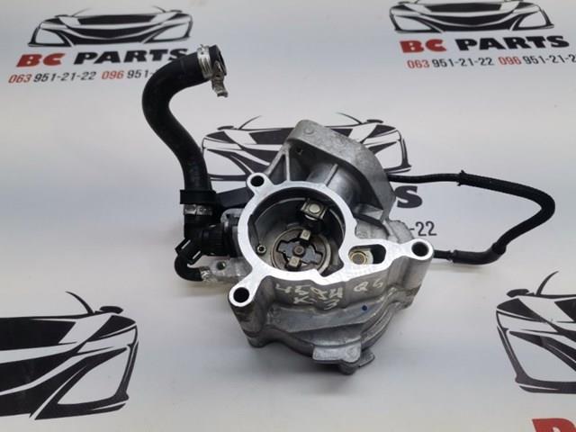 Насос вакуумний 06N145100E VAG