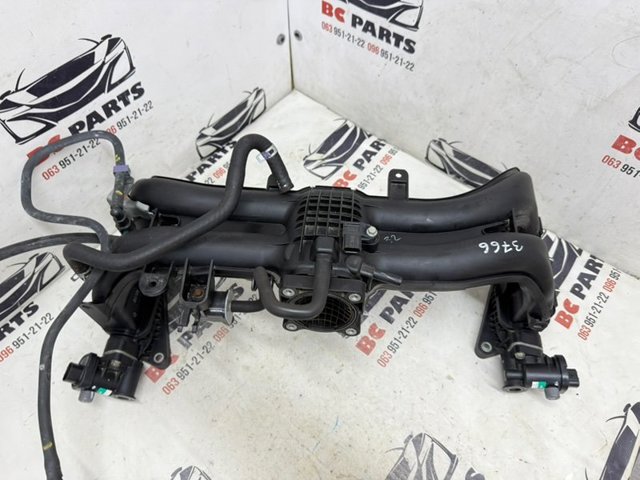 Колектор впускний 14001AC33A SUBARU