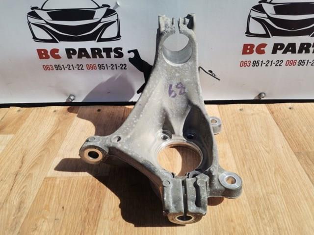 Цапфа поворотного кулака 400156RR0A NISSAN