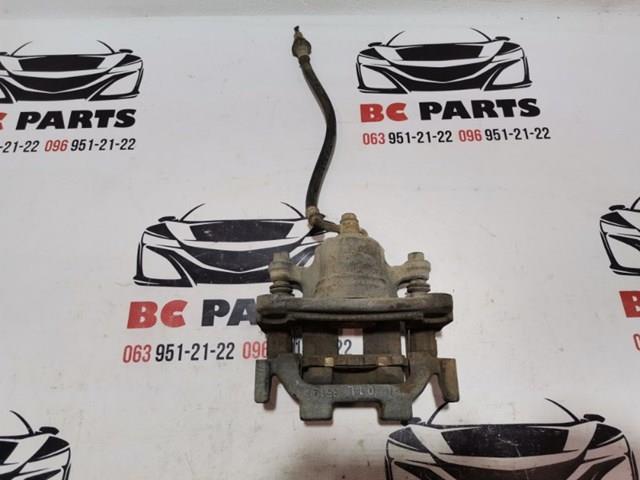 Задній гальмівний супорт лівий 440111BN0A NISSAN