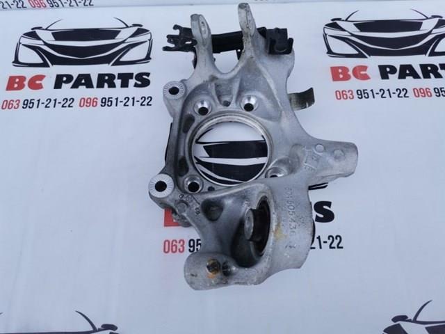 Цапфа поворотна права 80A505436J VAG