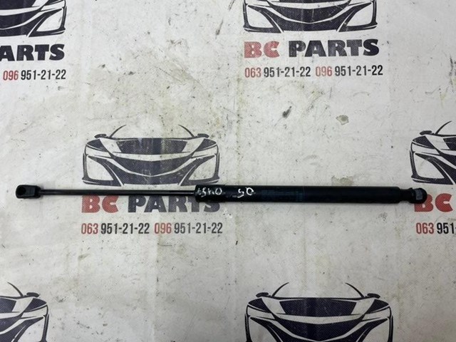 Амортизатор двері задньої 8R0827552A VAG