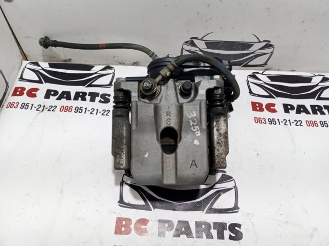 Супорт гальмівний задній правий D40006RA0A NISSAN