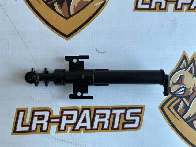 Форсунка омивача фари передньої, лівої LR061219 LAND ROVER
