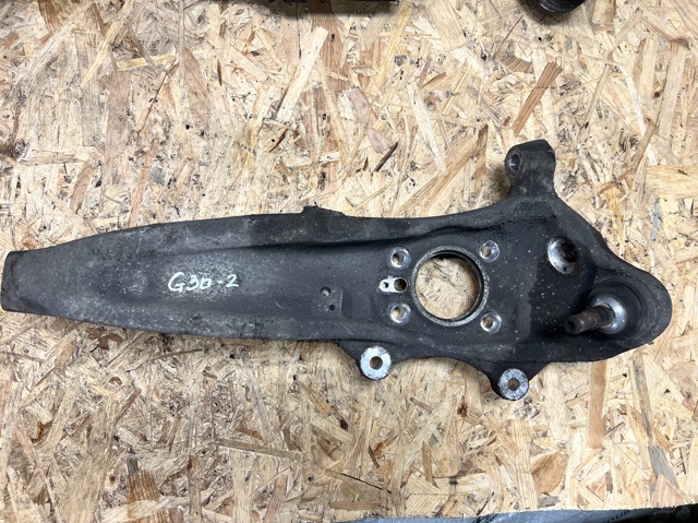 Цапфа поворотного кулака 31206884385 BMW