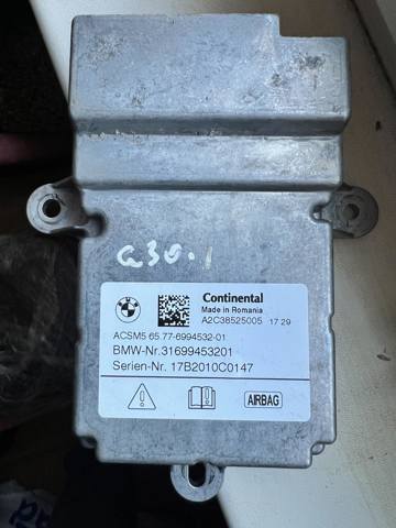Блок управління airbag 65776994532 BMW