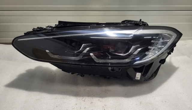 Блок фара ліва 63119851039 BMW