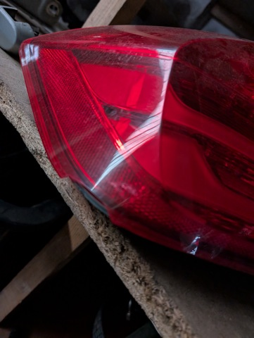 Задній лівий зовнішній ліхтар 63217313039 BMW