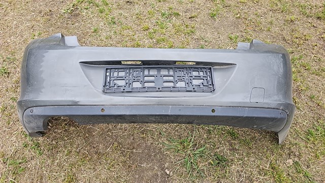 Бампер задній 20877796 OPEL