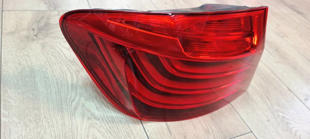 Задній лівий зовнішній ліхтар 63217312707 BMW
