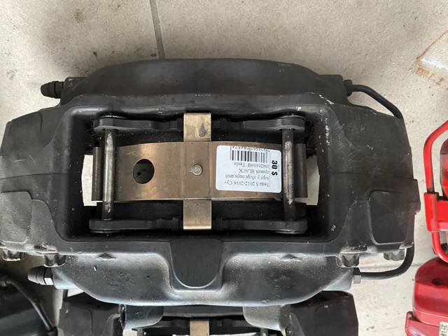Супорт гальмівний, передній, правий 104264000F TESLA