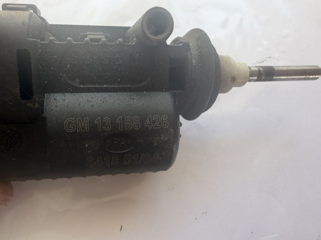 Мотор-привід відкриття лючка бака 13158426 GM