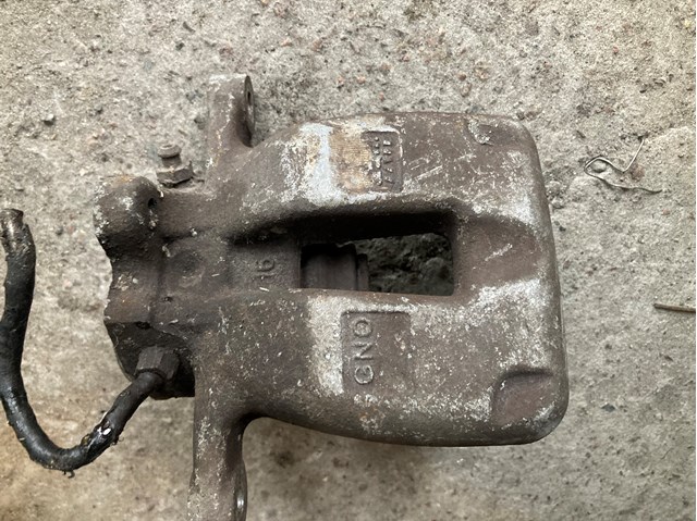 Задній гальмівний супорт лівий 3C0615403B VAG