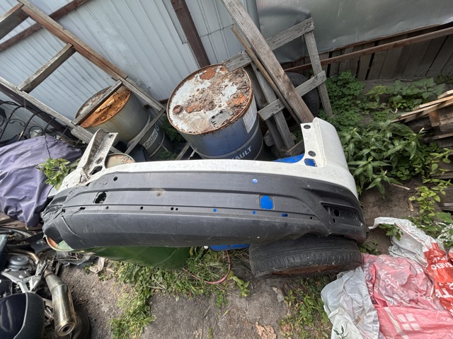 Буфер (бампер) задній TK4850221 MAZDA