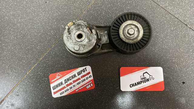 Натягувач приводного ременя 0614533 OPEL