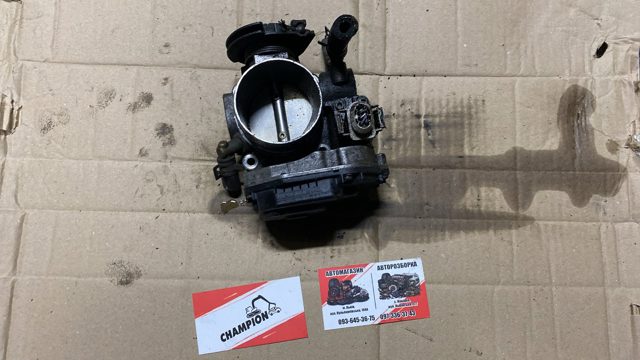 Блок дросельної заслінки 06A133064H VAG